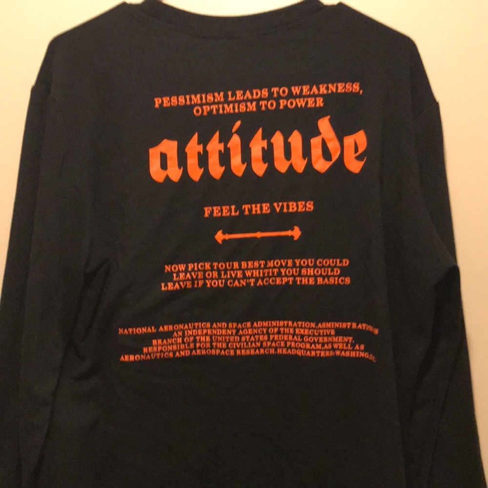 A sweater with a meaningful sayin